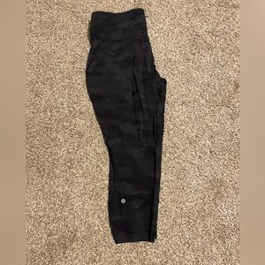 Women’s Lululemon leggings. Size 16. No piling noted. Black camo.